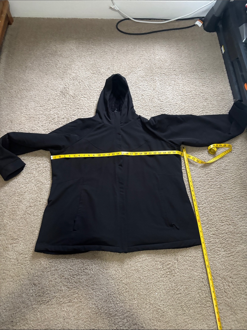 Women’s Black Hooded Jacket with Front Pockets. Inside is lined.